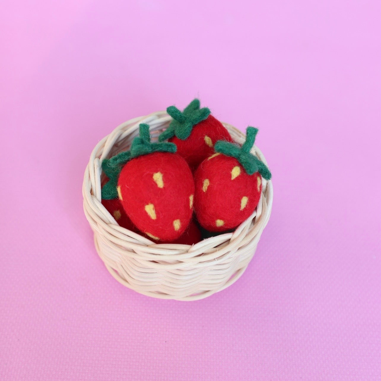 Six Strawberries in rattan ramekin